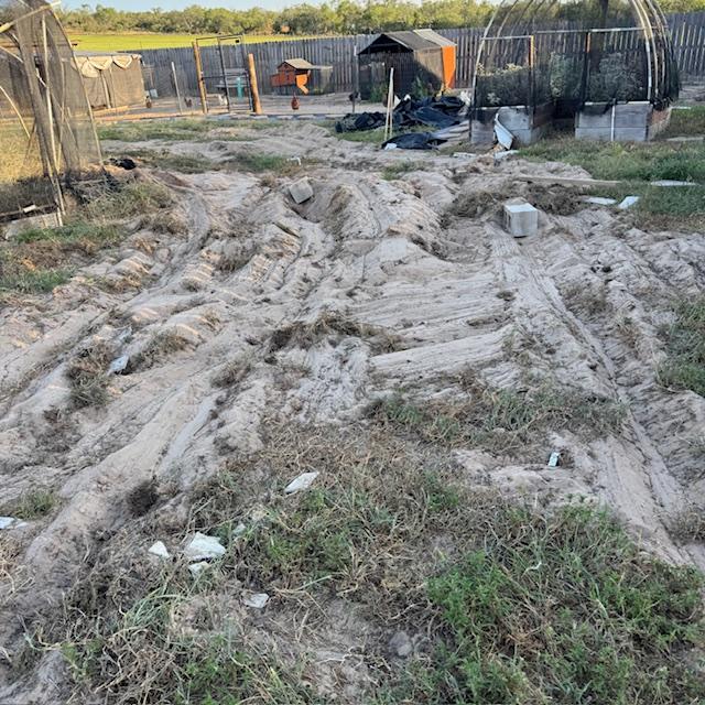 The shed was dragged toward the chicken coop. You can see parts of it were broken off. Everything is a mess. The shed was dragged toward the chicken coop. You can see parts of it were broken off. Everything is a mess.