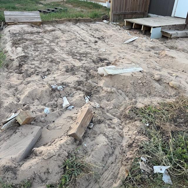 What a freaking mess plus no fence to keep the dogs in.