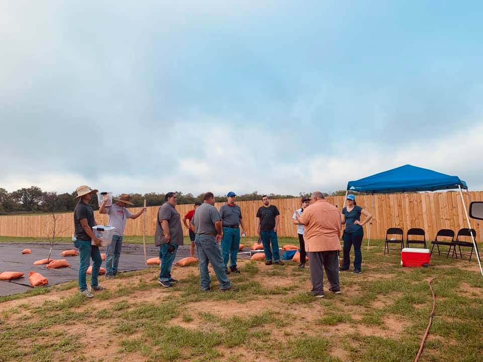 David meets with the DGS team and explains what we will be doing. A lot of them have never planted a garden before.