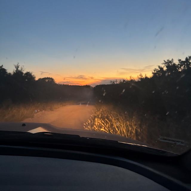 The sun was setting as we headed down the dirt road for home. Thank God we did not hit the big deer that popped up.