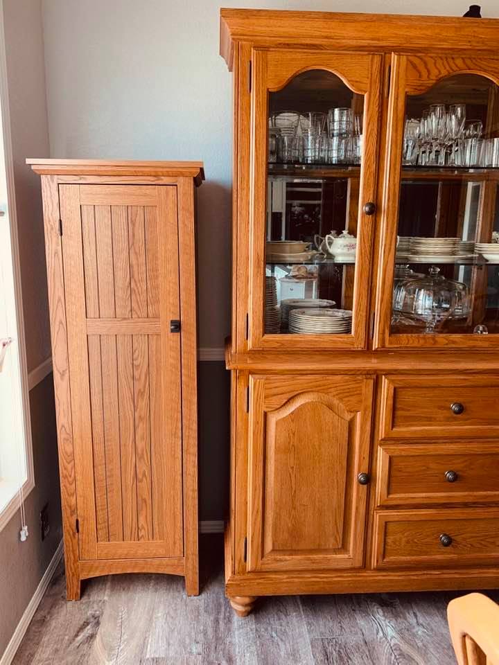 The new dog food cabinet goes well with the dining room furniture and will hide the dog food well. The new dog food cabinet goes well with the dining room furniture and will hide the dog food well.