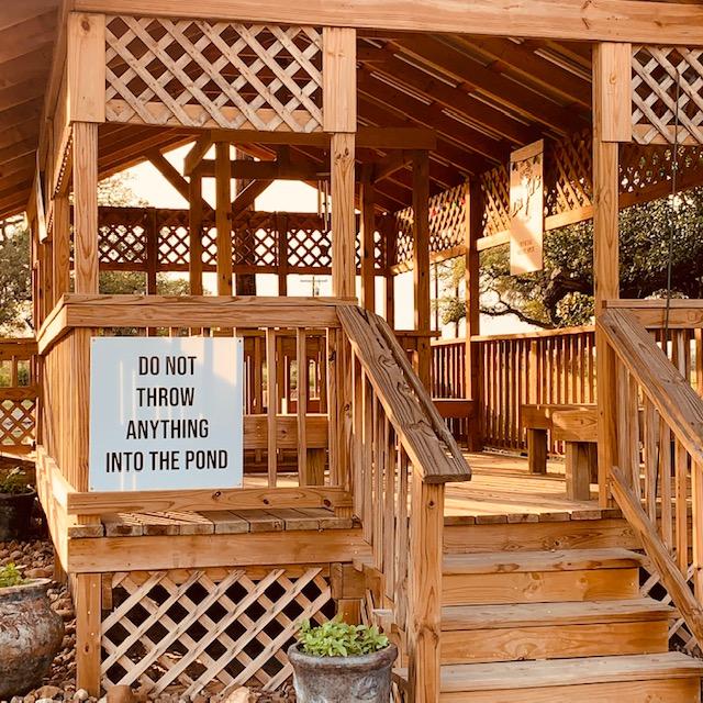 Can you believe we have to put up a sign on our beautiful gazebo because parents don't make their kids behave?