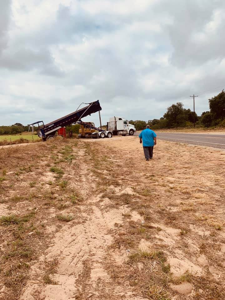 David walks over to find the project manager so he can alert him that the driveway is running through the place where our store will be. David walks over to find the project manager so he can alert him that the driveway is running through the place where our store will be.
