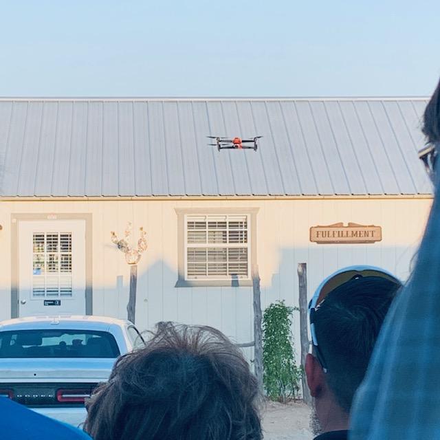 The drone is photographing us as it flies above our Fulfillment building.