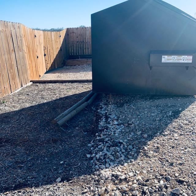 The dumpster has knocked the timbers and spikes out of place again. Just look at the mess.