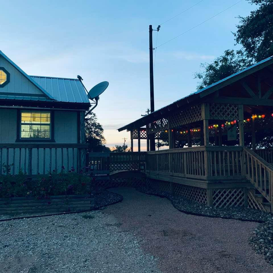 As dusk falls, the lights come on at the store and the gazebo, highlighting our seeds for sale.