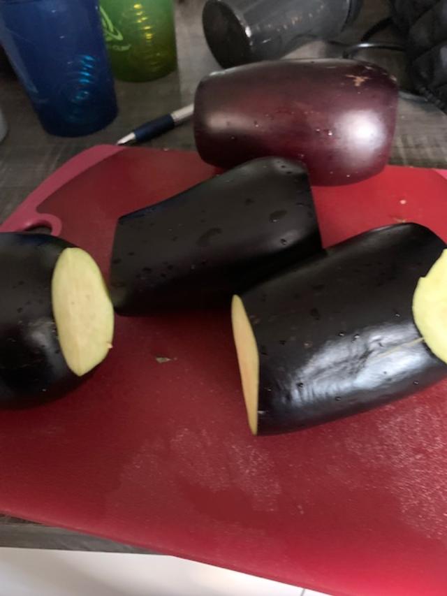 Cut the ends off of the eggplant.