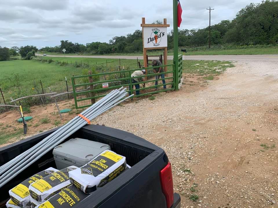 The electric gate people are here starting the process with cement.