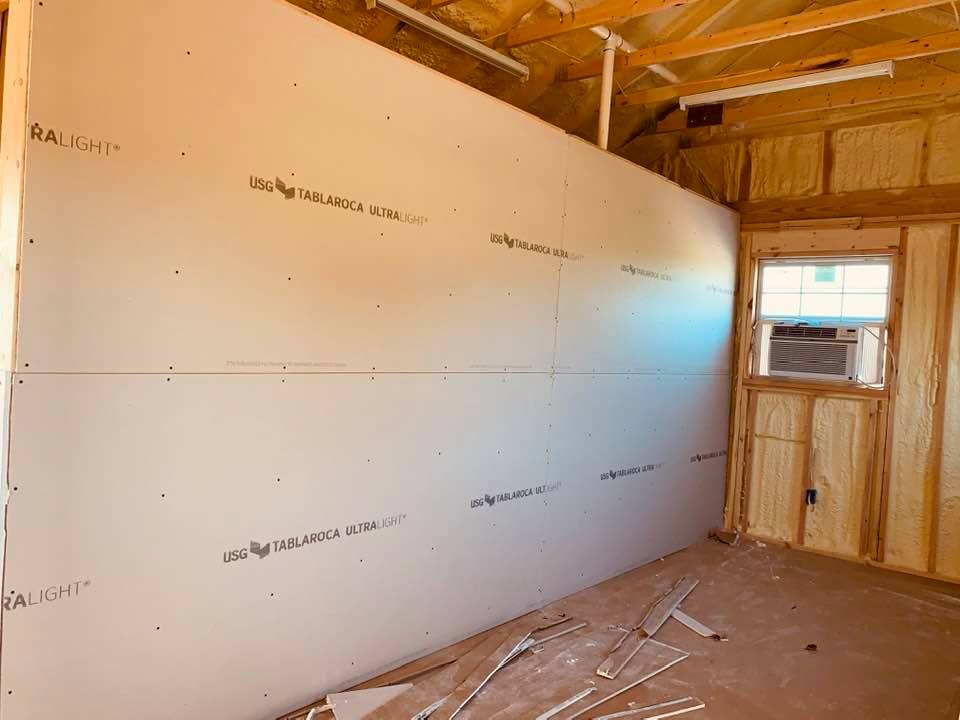 The 2 bathrooms are behind this sheet rock with outdoor access only so that our customers who come from an hour or more away can use them. Shown is what will be the employee breakroom.