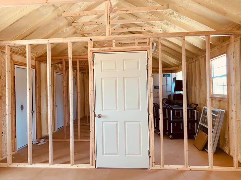 This is taken from kitchen space looking into employee break room, storage and two bathrooms that will be reached from the outside of the building.