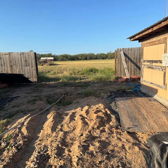 Here the fence was taken down by the chicken coop for the green shed to go through.
