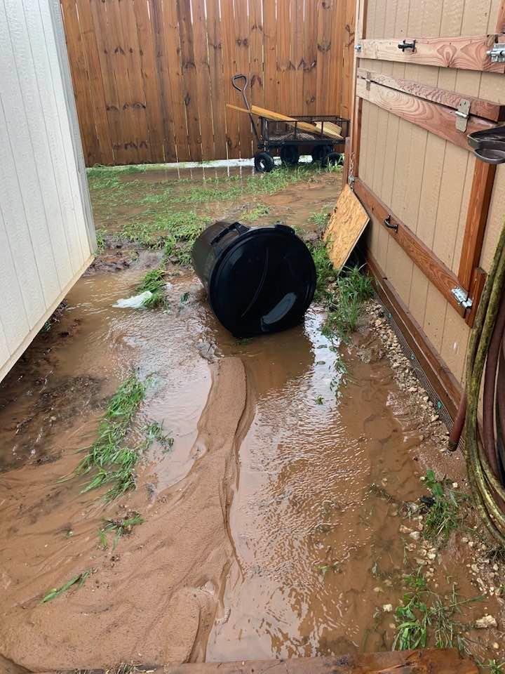 More flooding between the feed shed and the chicken coop. It washed away the trash can that is used for composting chicken poo.