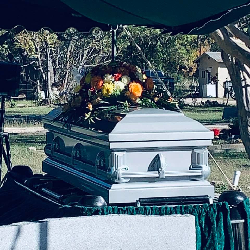 We donated all of the flowers to the First Baptist Church since there were also boutonnieres for the honorary pallbearers. That way the ushers can use them tomorrow.