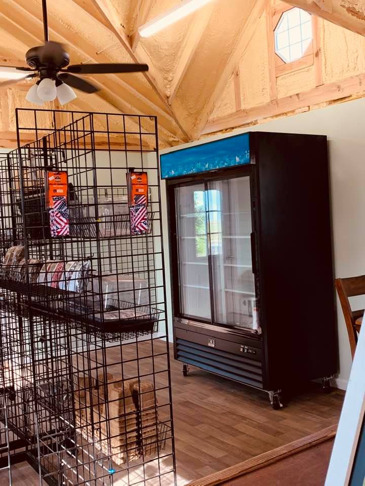 Our commercial refrigerator looks good in its new spot. Our store is going to be beautiful.