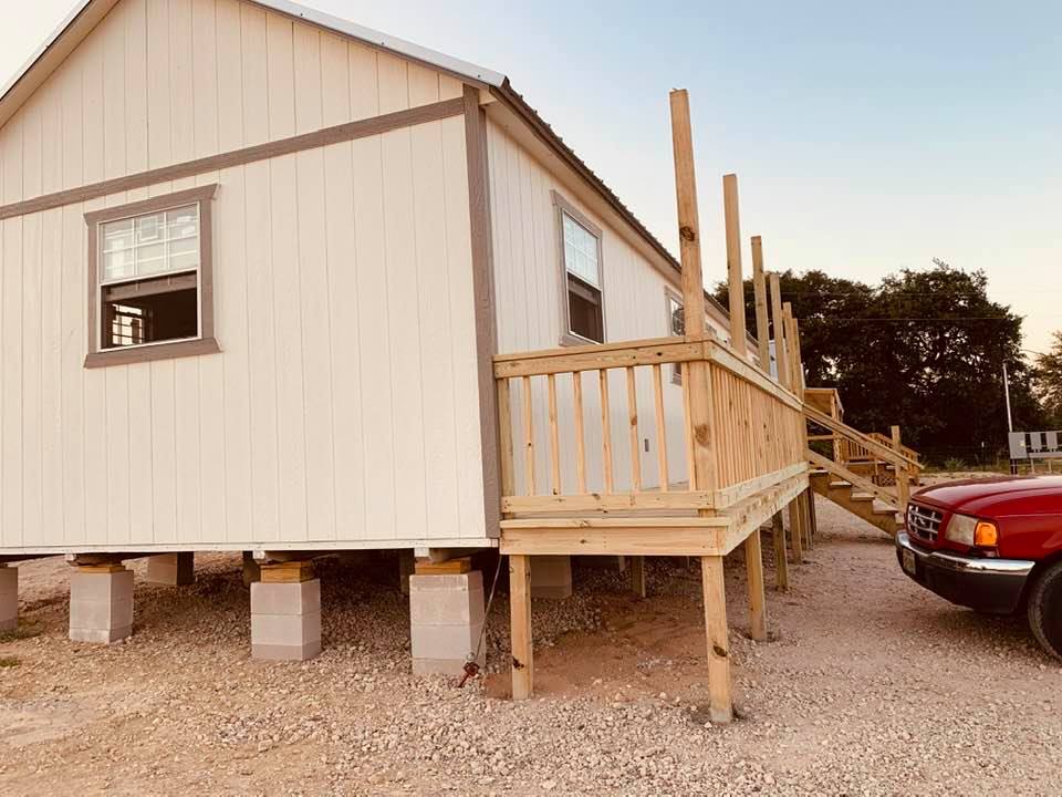 The front porch is on the left side of our new building so far.