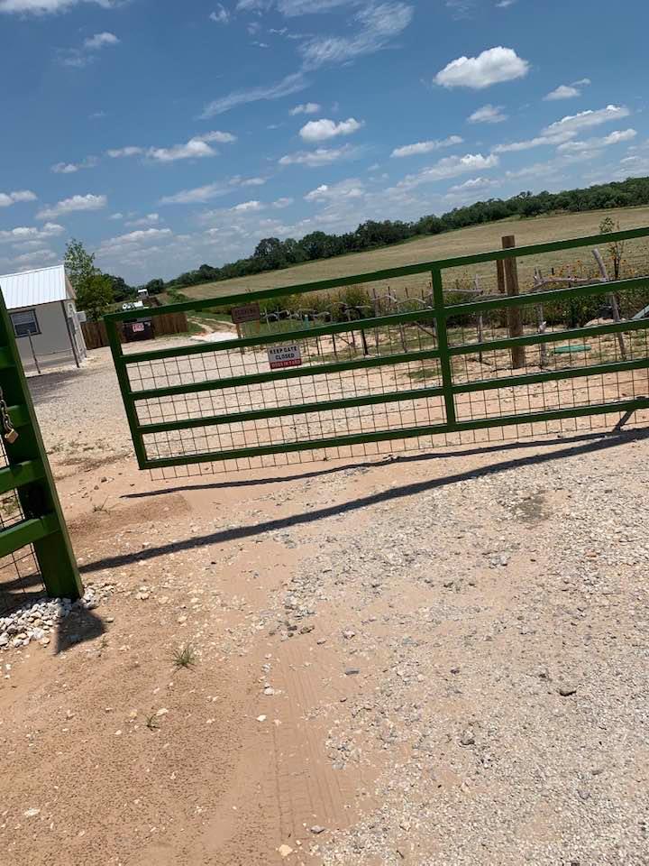 The electric gate is now opening using the key pad! You can see our neighbor's hay field is all mowed. The electric gate is now opening using the key pad! You can see our neighbor's hay field is all mowed.