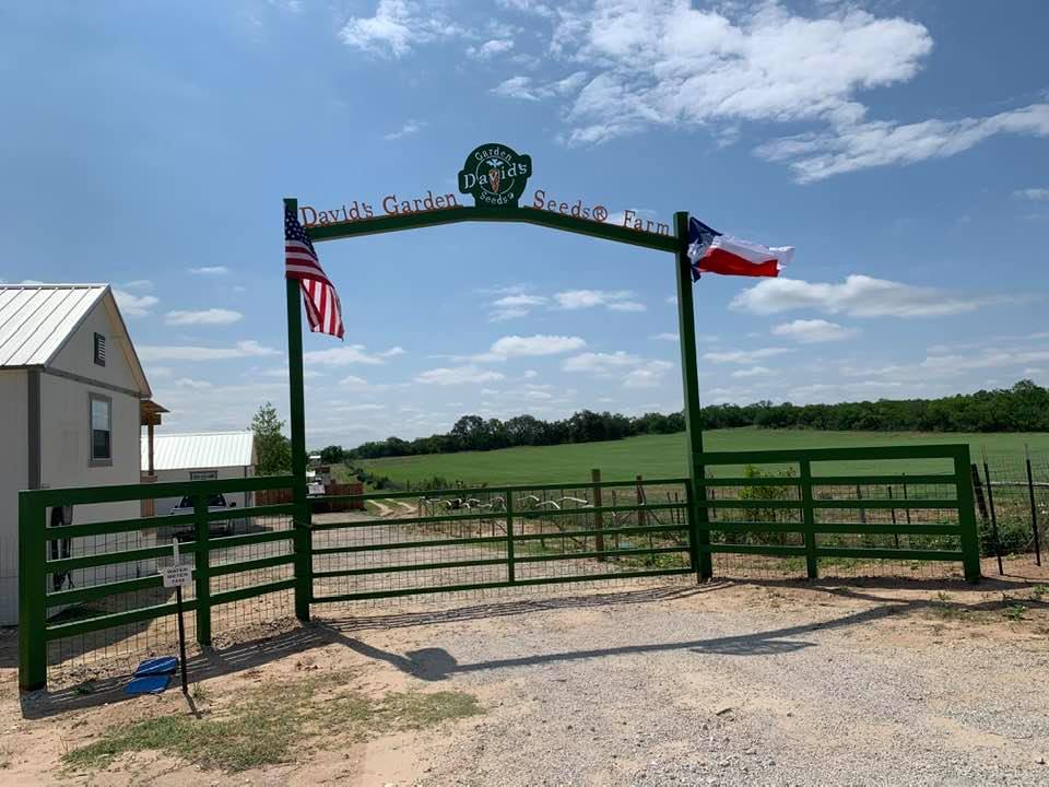This is our front gate with David's Garden Seeds® right over the top. You can't miss the bright green and orange paint.