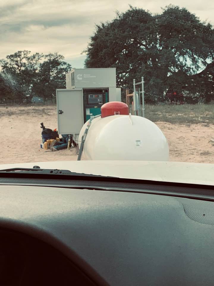 Generator technicians are giving an oil and filter charge to the hard working generator.