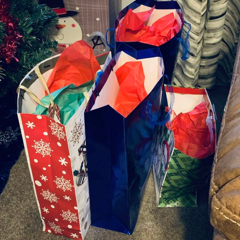 Gift bags make Christmas gift ideas a lot easier since you don't have to painstakingly wrap everything. Just add a bit of tissue paper and you are set!