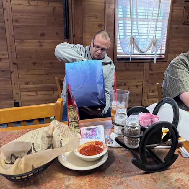 Opening gifts. Happy birthday, Matthew!