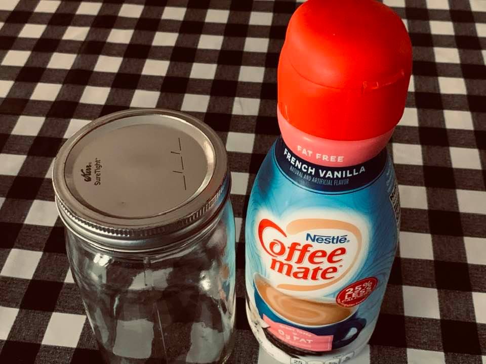 The mason jar with something white...