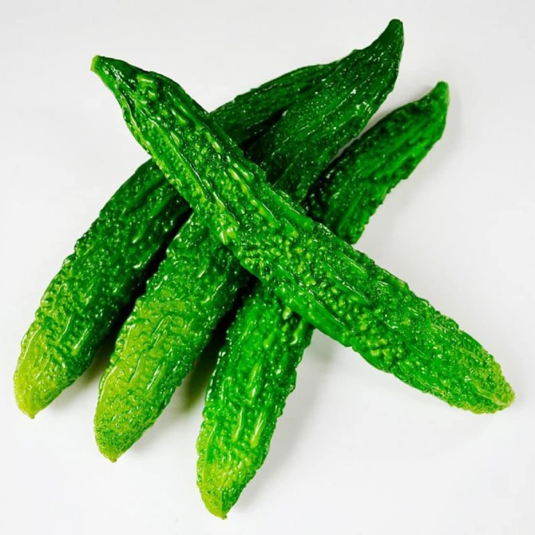 This is bitter gourd which you can eat like a melon. Most gourds are not eaten but are used for decorative purposes. This is bitter gourd which you can eat like a melon. Most gourds are not eaten but are used for decorative purposes.