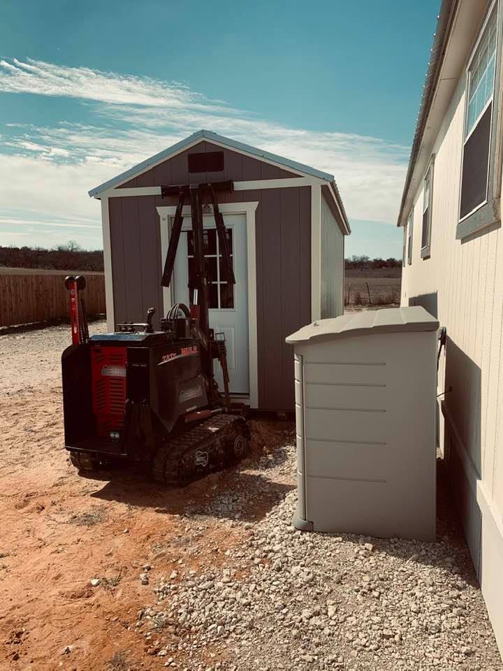 Here, the grey building was placed with a little motorized vehicle, next to the production building where we count and pack seeds.