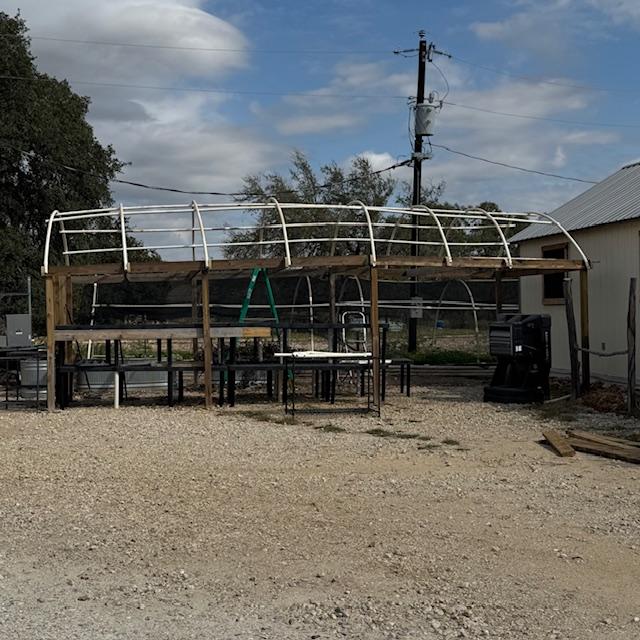 The front plant area by the Farm Store is being changed into a greenhouse high tunnel where David will grow spring veggie plants this winter for sale in spring.