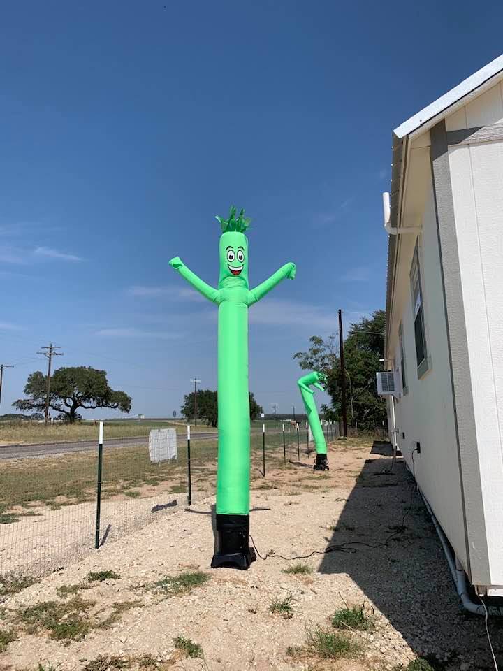 The green dancing men are on the highway that goes by our store. Hopefully, they will attract some attention. So far, they have not.