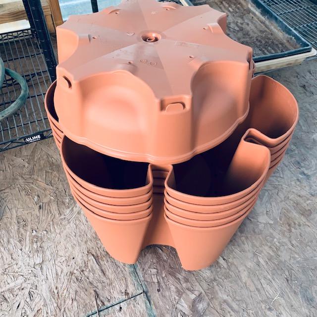 One of the best container garden ideas is to buy a Greenstalk unit. This one will house my spring herbs. It will be heavy when I get it put together with soil.