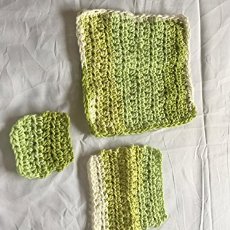 Crocheted washcloth set I made from cotton yarn. The smallest square is a facial scrubby for removing makeup.