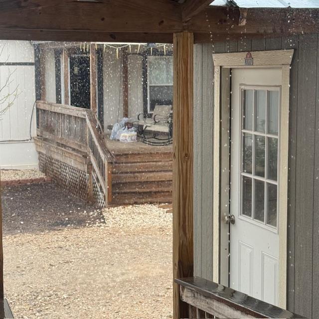 Some of the groceries are still on the deck in the rain in this photo.