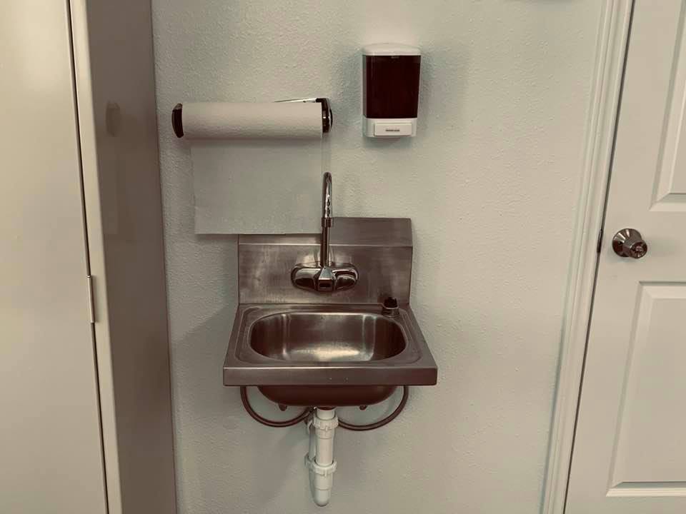 Small handwashing sink that is required.
