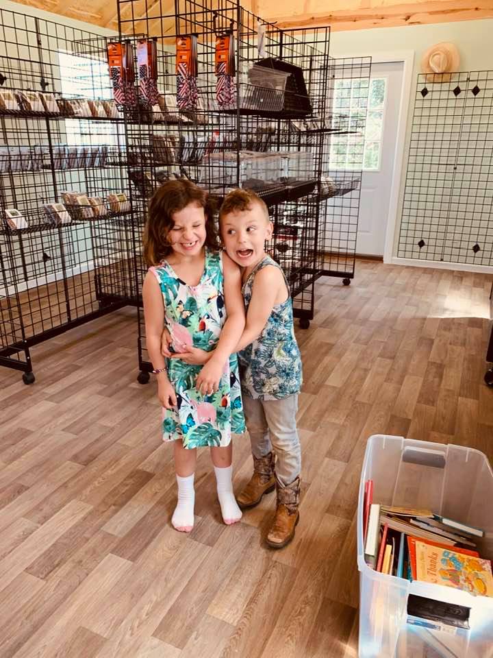 Holley and Max playing in the store while I am filling orders. Yes, they have big personalities just like the photo suggests!