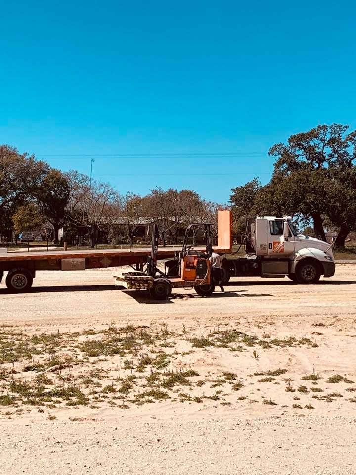 Home Depot guy unloaded wood and delivered it to our front door.