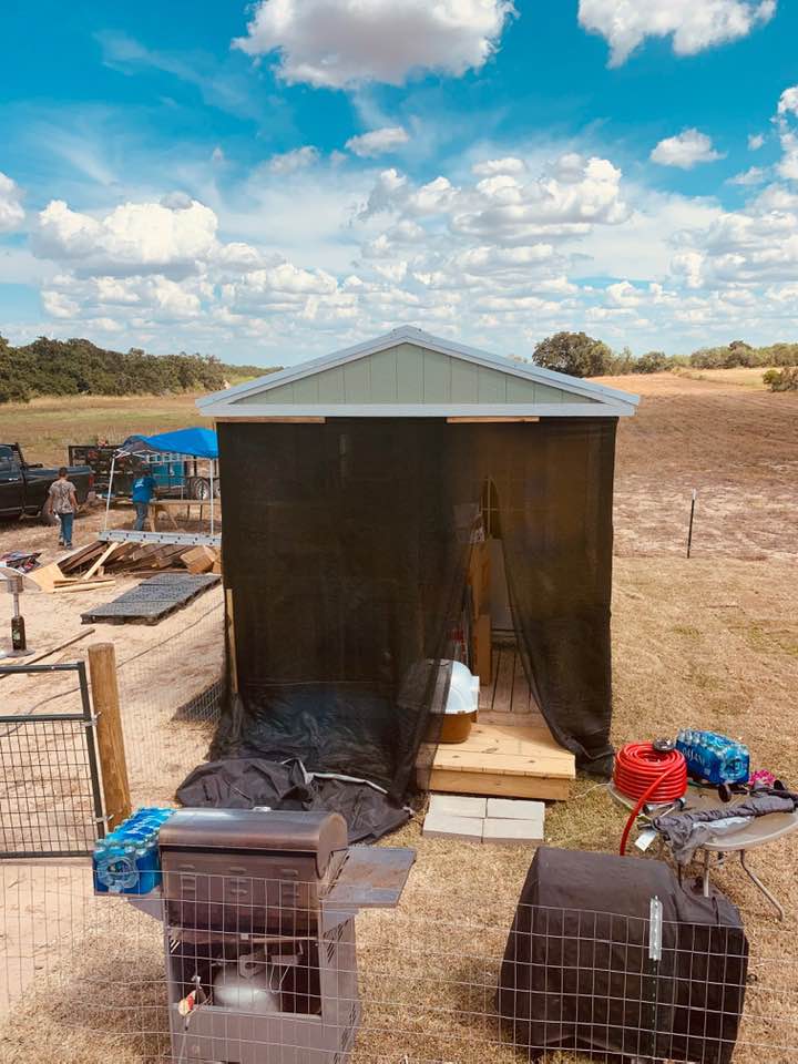 This is the green shed shack where we lived while waiting for Palm Harbor to get their act together. You can see people working in the back on the land.