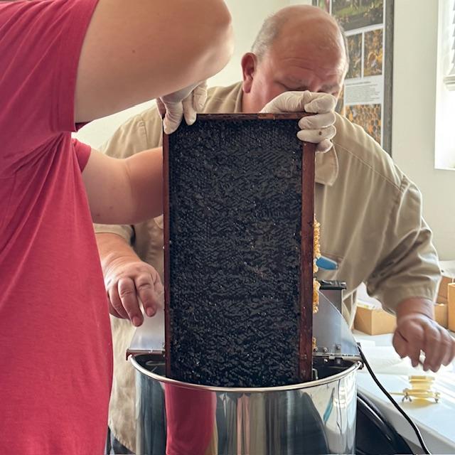 Matt and David put the first frame into the spinner.