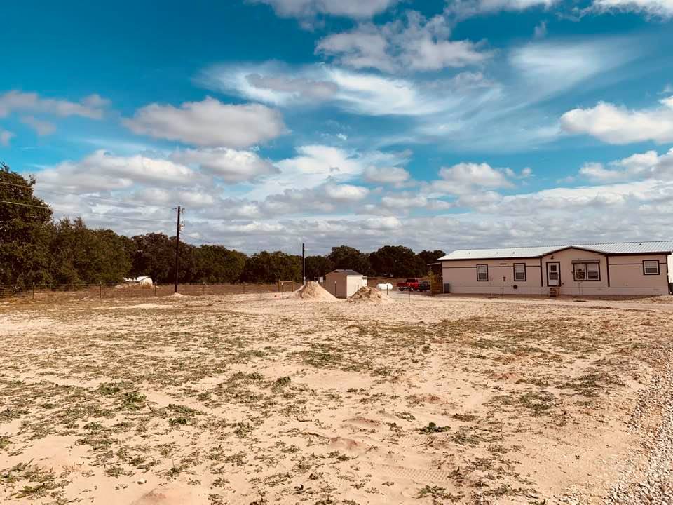 Farm plans for the front yard include our new David's Garden Seeds® store that is currently in San Antonio as well as another building for producing seed packs.