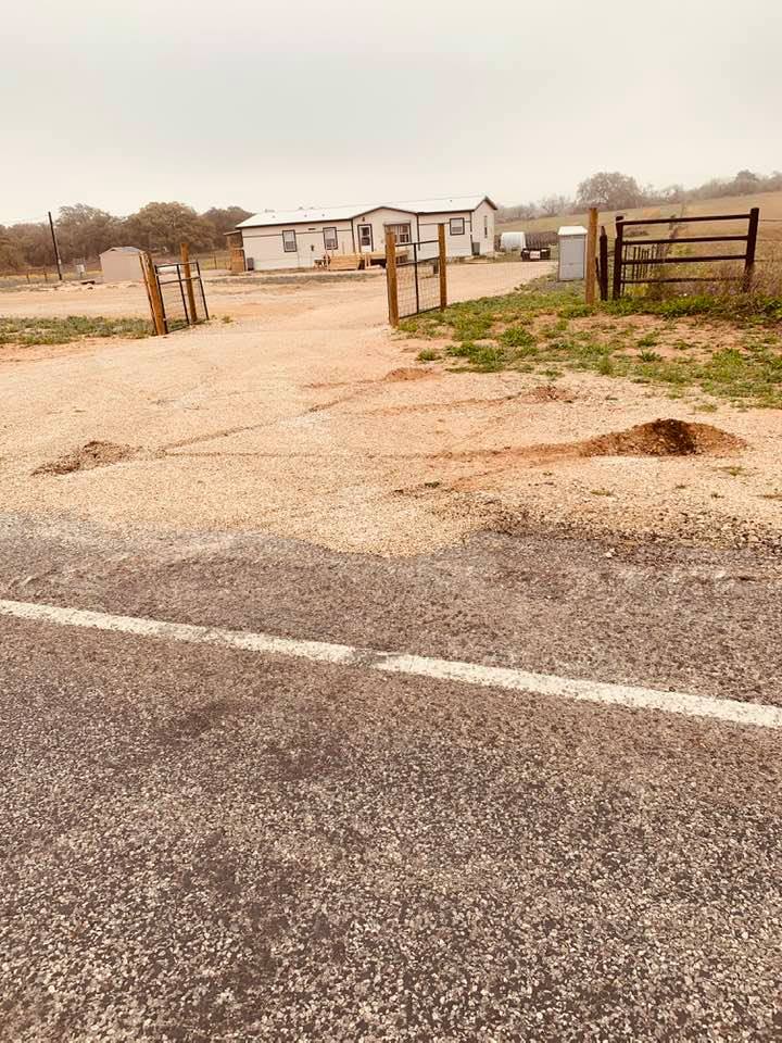 This is how our home looked from the road when they finally got it set up. Everything looks different now.