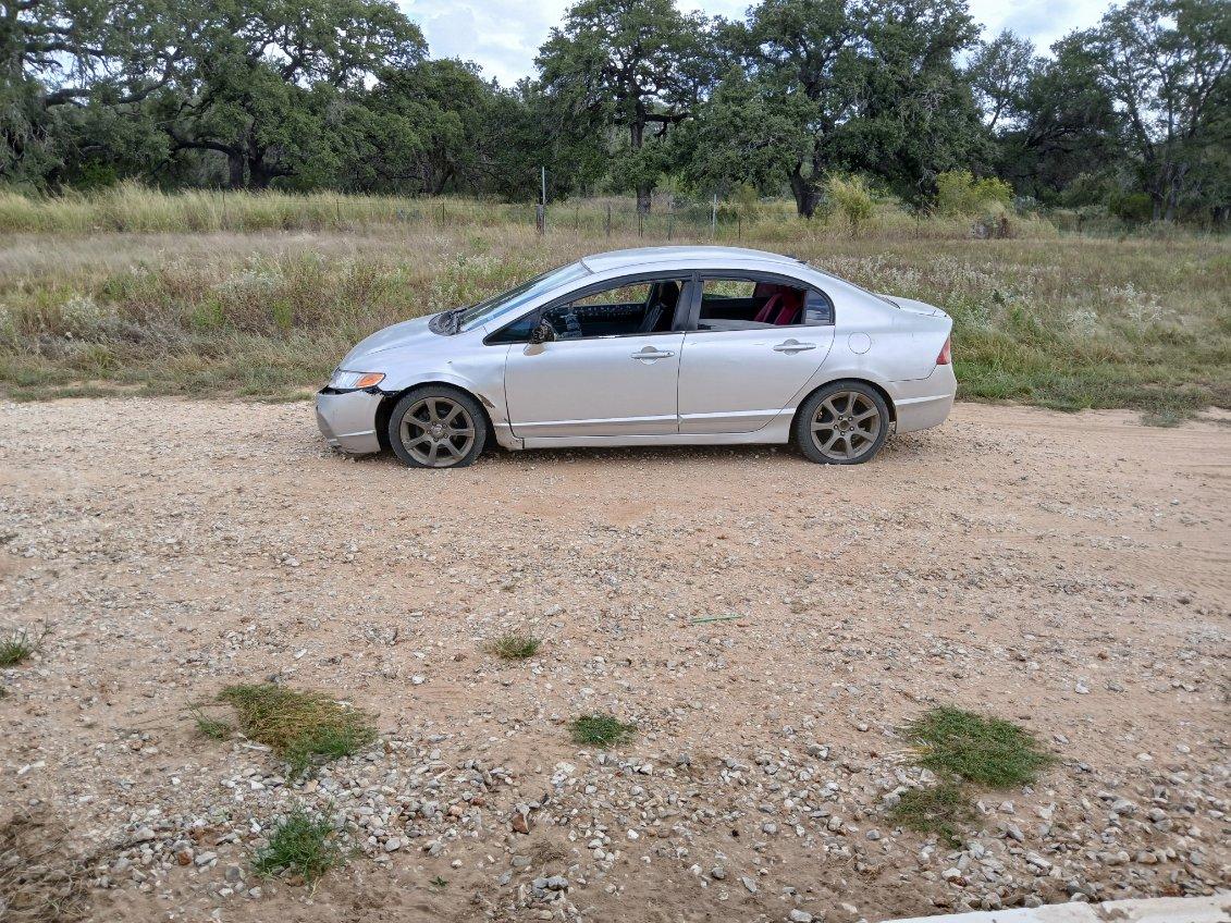 This is the car that went through the fence. It was towed.