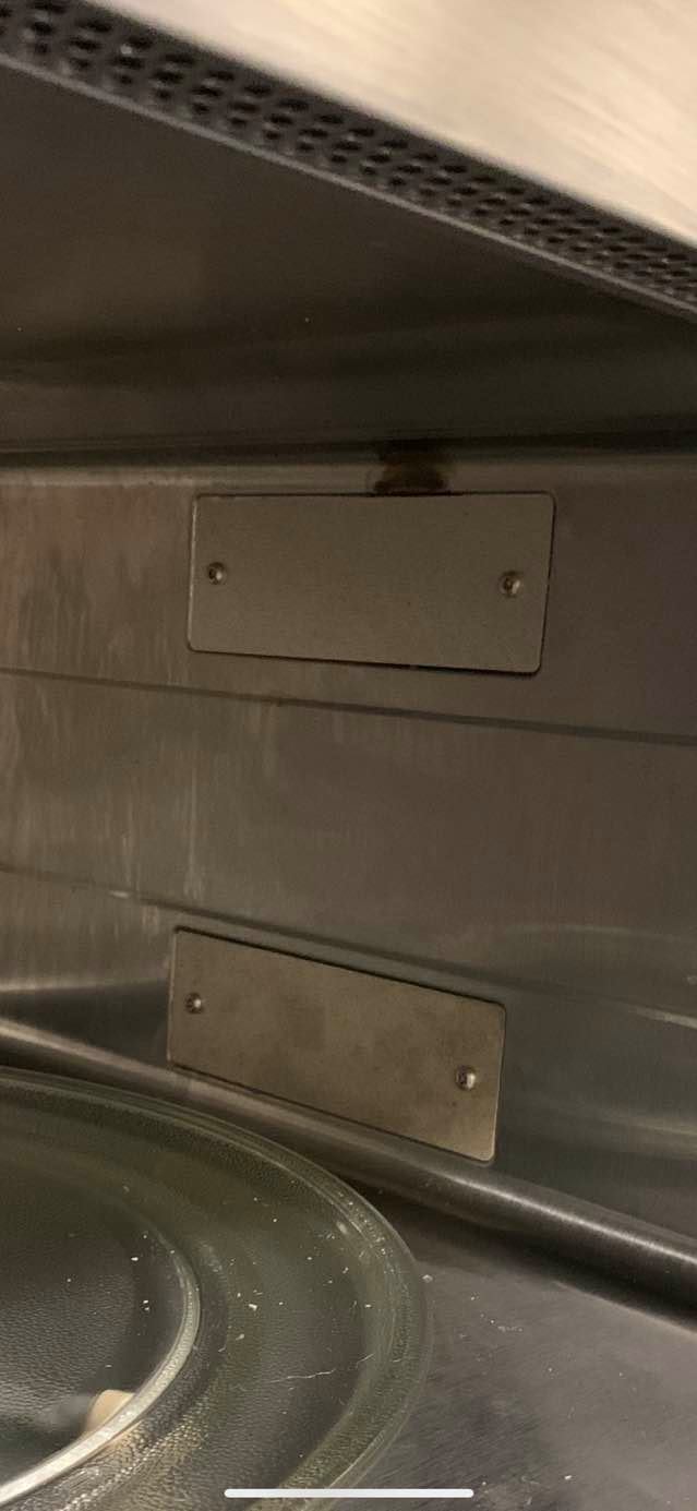 The top piece was replaced. You can see the burn mark which we cannot get off.