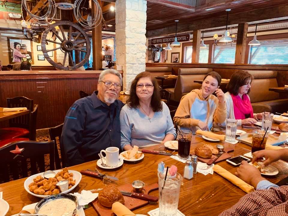 Jay's dad and stepmom sat right across from the birthday boy at Salt Grass Steakhouse in San Antonio.