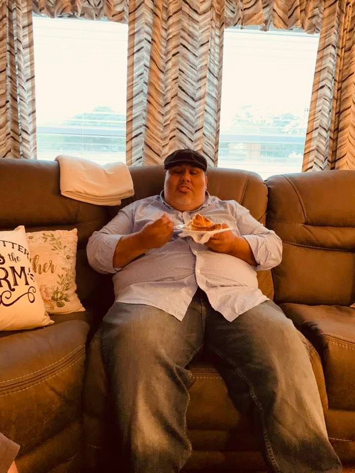 Jay eating apple pie in our new living room on his birthday!
