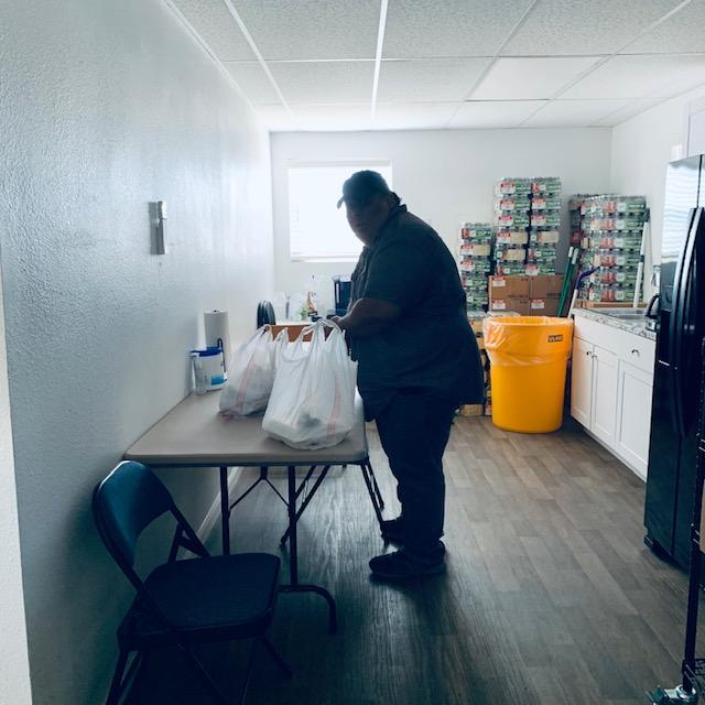 Jay is setting out all of the different lunch tacos for today's working lunch in the employee breakroom. I had the chicken tacos.