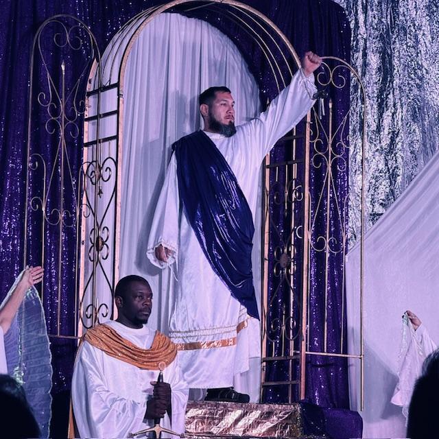 Jesus holds the keys and stands at Heaven's Gates with angels.