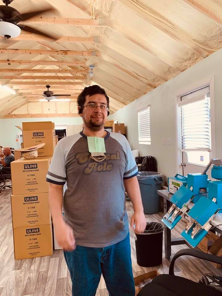 Happy birthday, Joshua! You can see one of our seed counting machines behind him.