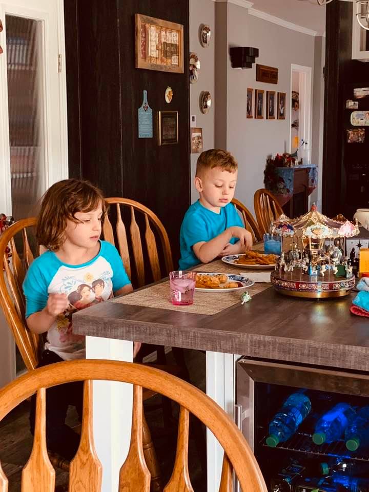 Holley and Max having a snack on the island.