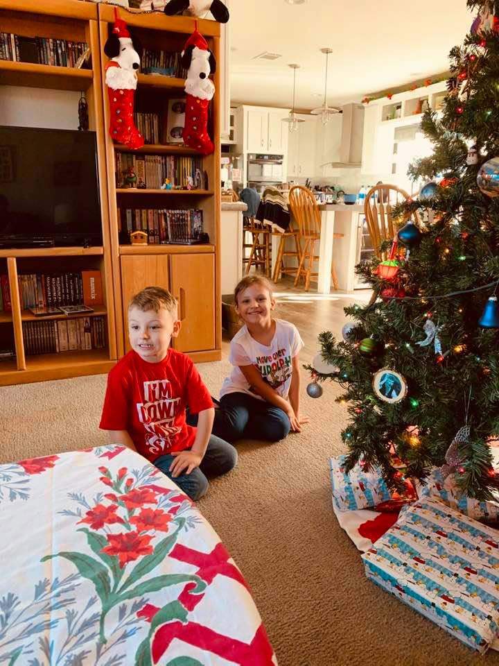 Max and Holley waiting to open gifts.