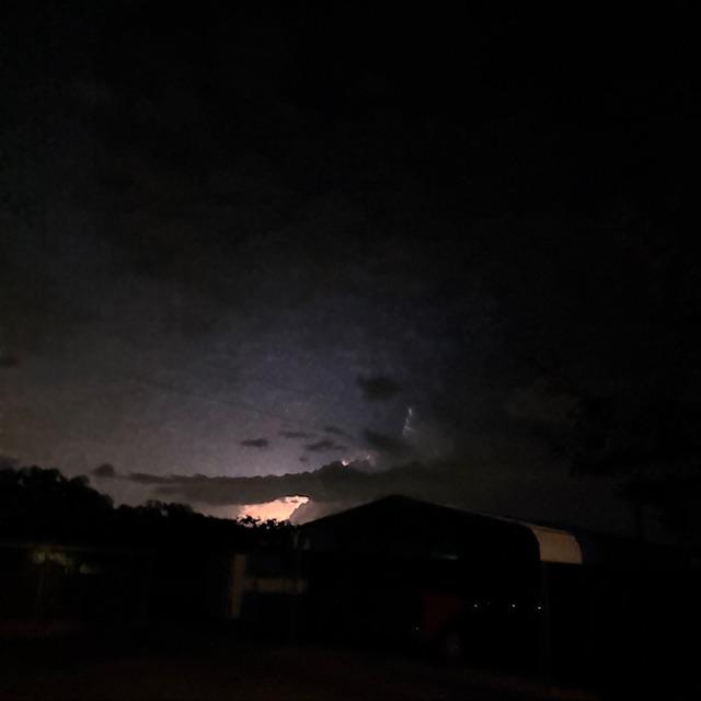 Christmas Eve lightning in the northern skies above the carport.