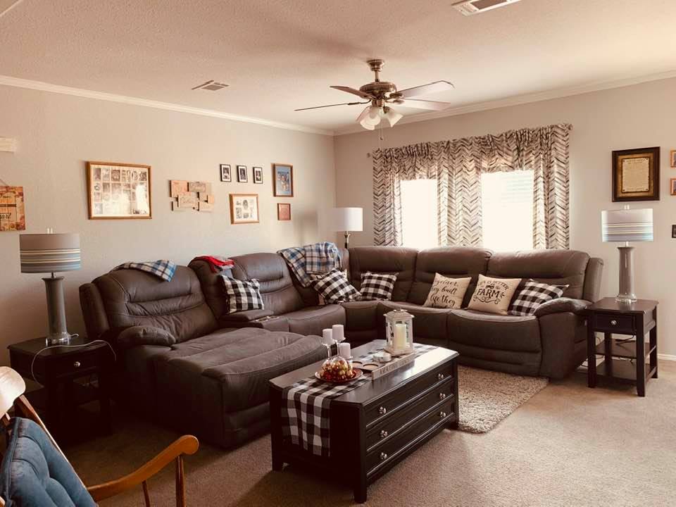 Finally, after 5 months, all of our new furniture was delivered. Today's delivery was one lamp and the two end tables.